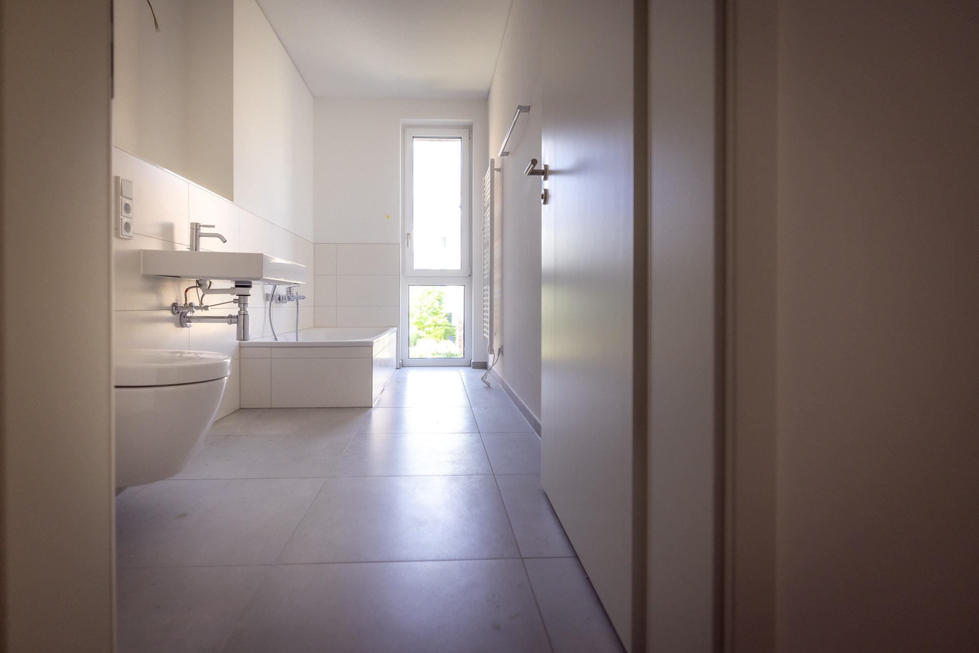 Badezimmer Mehrfamilienhaus Wasserstadt-Limmer-Baufeld 14 - König Projektbau